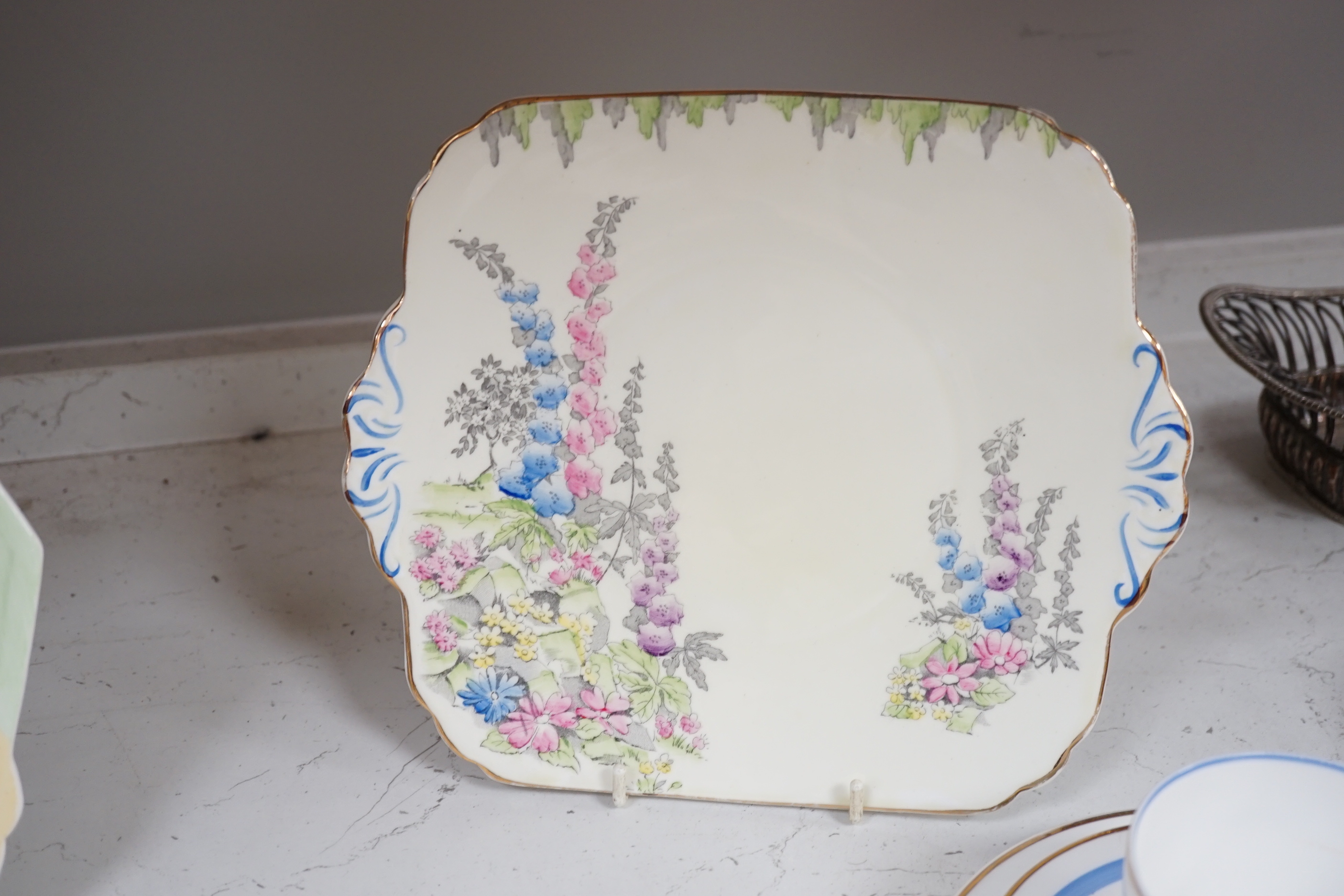A Shelley Art Deco tea set numbered 795072 and sandwich plate together with a similar Foley plate, the largest 24.5cm wide